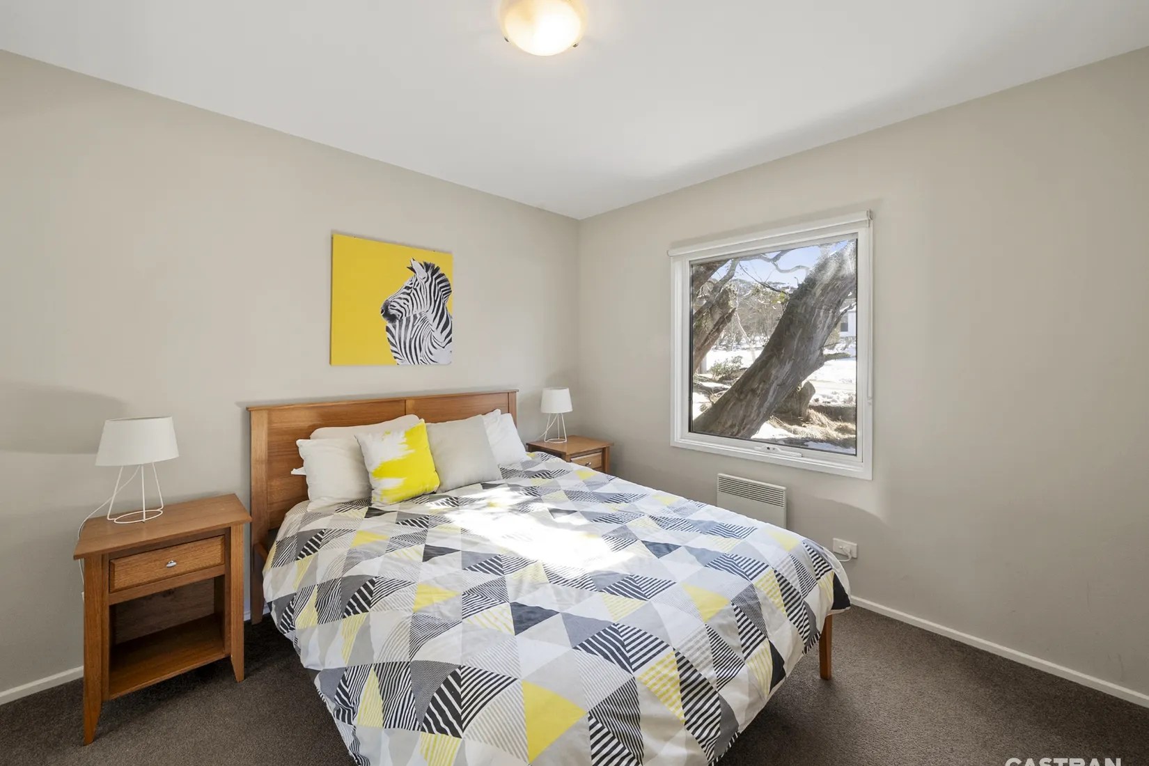 image of a queen bedroom in alpine edge in dinner plain
